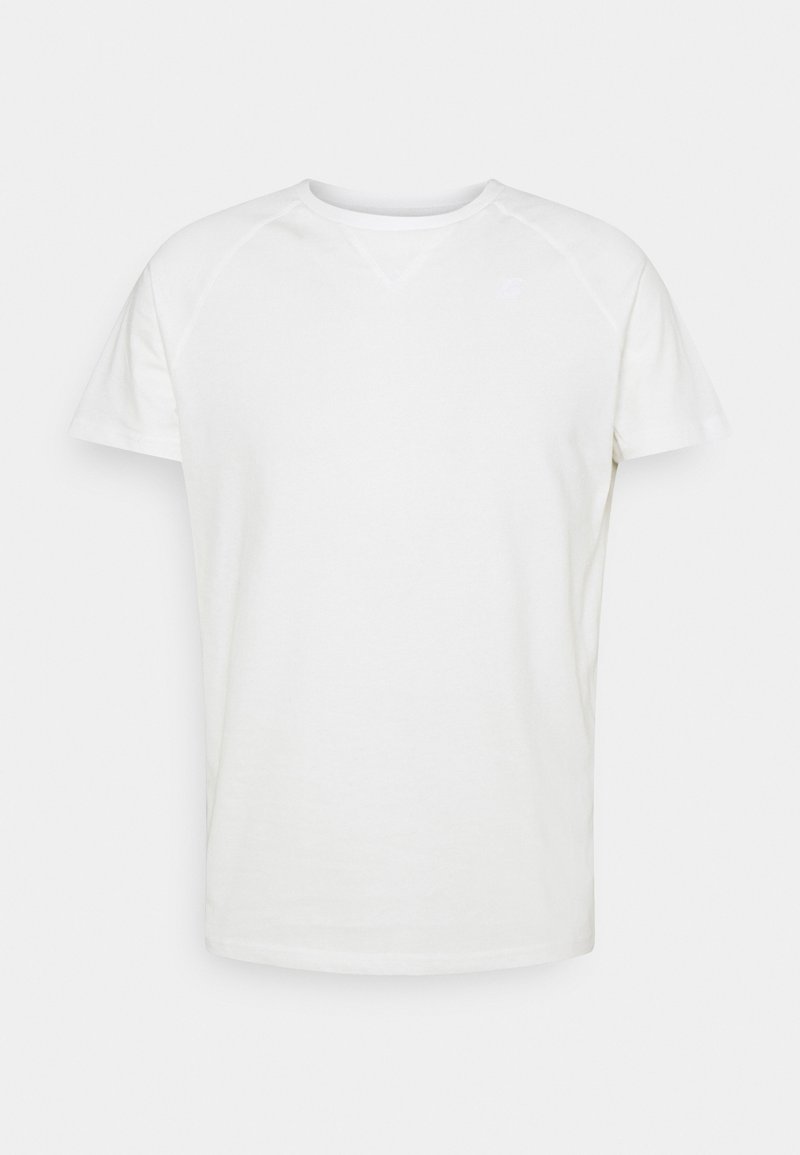 T-shirt blanc à manches courtes avec col rond et manches raglan. Fabriqué en tissu mélangé coton avec une texture lisse et un branding minimal sur la poitrine.
