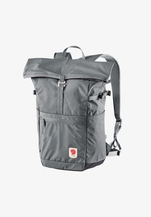 Gray roll-top backpack with a front zip pocket, adjustable shoulder straps, and logo patch; made of durable, textured nylon material.