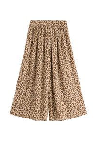 Leopardmönstrade shorts i beige och brunt, med elastisk midja och lös passform, tillverkade av lättviktig tyg med en mjuk yta.