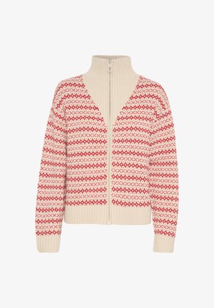 Pika pikkade varrukatega, tõmblukuga kardigan beežis, millel on keerukad punased geomeetrilised mustrid. Omab kõrget krae ning soonikuga mansette ja äärt.