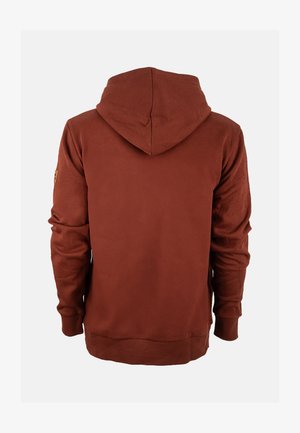 Brązowa hoodie z kapturem na sznurki, długimi rękawami i ściągaczami na mankietach. Posiada małą naszywkę z logo na lewym rękawie. Miękka tekstura materiału.