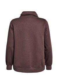 Sudadera marrón con cuello alto, mangas largas y dobladillo recto. Confeccionada en una tela suave, con una textura lisa y un detalle mínimo.