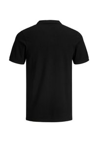 Polo noir à manches courtes avec un col classique. Fabriqué en coton lisse, avec un design uni et sans logos ni motifs visibles.