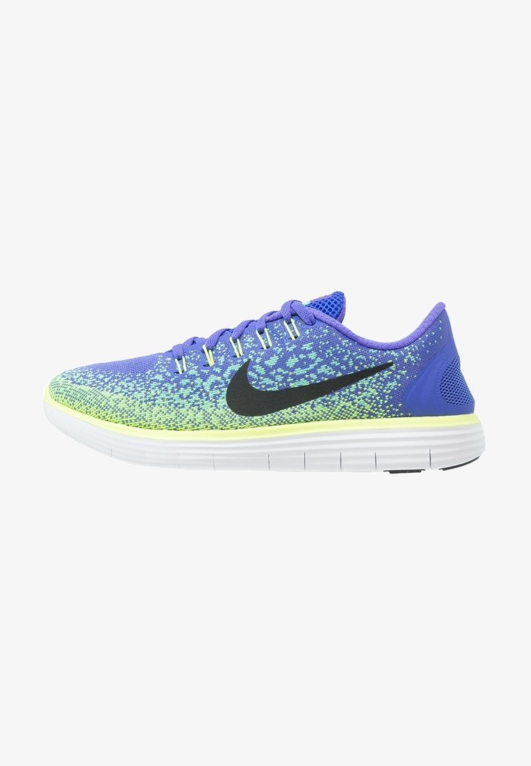 Chaussure de course Nike violette et verte avec logo swoosh noir, semelle blanche et empeigne en mesh, vue de côté.