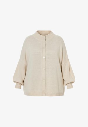 Cárdigan beige de punto con cuello redondeado, cierre frontal con botones y mangas sueltas. Presenta puños y dobladillo acanalados. Superficie texturizada.