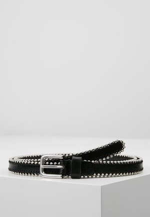 Black leather belt with silver buckle and round silver studs lining the edges, displayed coiled on a white surface.