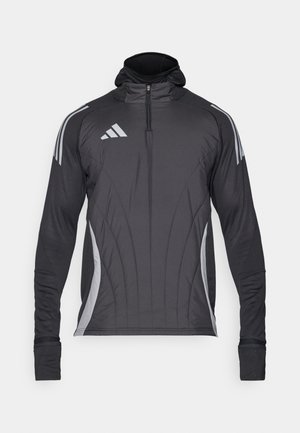 Black athletic jacket with a hood, zippered front, and long sleeves. Features grey stripes and a fitted design with textured fabric.