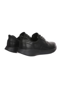 Black leather lace-up shoes with a smooth finish, rounded toe, and flexible rubber sole featuring textured side patterns for grip.