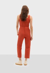 Thinking Mu RAFFLESIA  - Kombinezon - red