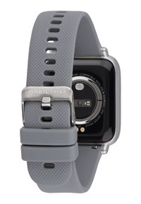 Montre intelligente en silicone gris avec un bracelet texturé et une boucle en métal. Le cadran de la montre est noir, affichant des éléments fonctionnels et des capteurs.
