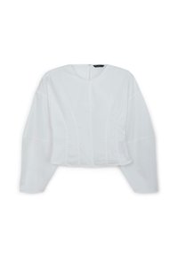 Blusa bianca corta con maniche lunghe, caratterizzata da un collo rotondo, dettagli con cuciture verticali e una chiusura lampo discreta sul retro.