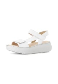 Weiße Leder-Plateausandalen mit Klettverschluss-Riemen, offenem Zehendesign und strukturiertem Boden. Mit einem gesteppten Rand entlang der Plattform.