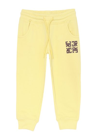 Pantaloni da jogging gialli per bambini con elastico in vita, coulisse, tasche laterali, polsini a coste e logo scuro sulla coscia sinistra.