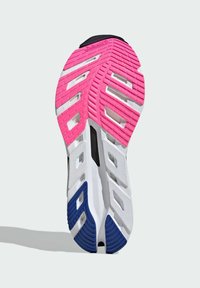 Schoenzool met een mix van roze, witte en blauwe rubber, met een gestructureerd oppervlak en duidelijke groefpatronen voor grip.