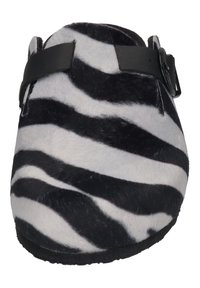 Zebra-patterned slipper made of soft, textured material with a black adjustable strap and a sturdy black sole.