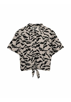 Chemise beige à manches courtes avec boutons, imprimé animalier abstrait noir et nœud à l'avant.