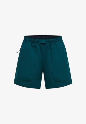 Shorts de sport bleu sarcelle foncé avec taille élastique et poches latérales zippées, conçus pour la performance et le confort.