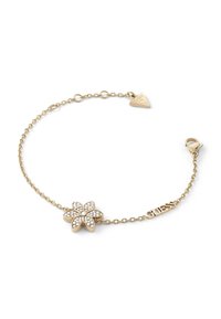Gouden bloemenarmband met een met edelstenen versierde bloemenbedel en een driehoekig "Guess"-label. Voorzien van een schakelketting en een sluiting met haak.