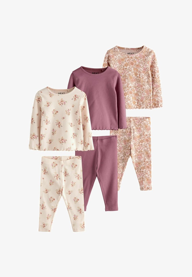 Trois ensembles de hauts à manches longues et leggings pour enfants avec des motifs floraux et unis mauves, disposés sur un fond blanc.