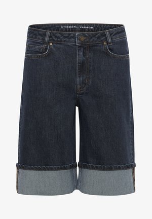 Džínové šortky v tmavě modré barvě s výměnným lemem v světlé modré. Obsahují klasický design s pěti kapsami a zapínání na knoflík v pase.