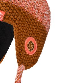 Knitted earflap hat in orange and brown, featuring a textured pattern, black lining, and a circular logo patch with a compass design.