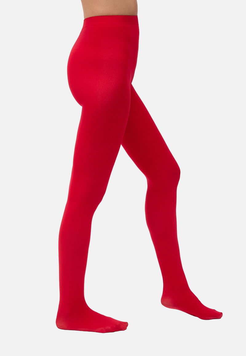 Medias rojas con una textura suave y un ajuste ceñido. El diseño presenta cobertura total, piernas sin costuras y una cinturilla elástica en la parte superior.
