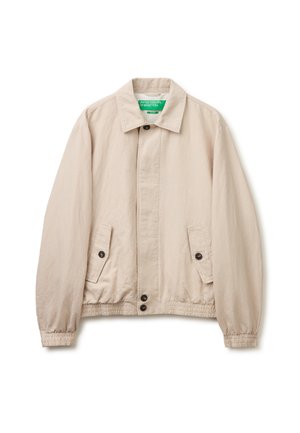 Beige Cordjacke mit Kragen, vorne geknöpft, zwei Klappentaschen mit Knöpfen, elastische Bündchen und elastischer Bund.