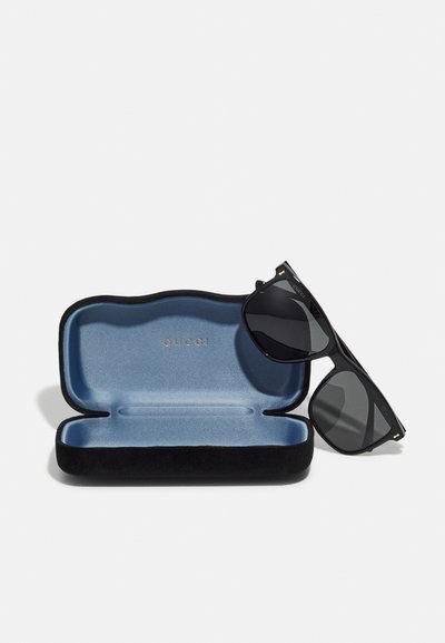 Gucci Aurinkolasit - black/grey