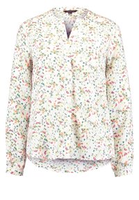 Valkoinen paita, jossa on kukkakuosi, jossa on vaaleanpunaisia, sinisiä ja vihreitä kukkia. Siinä on pitkät hihat ja V-mallinen kaula-aukko, jossa on nappilista.