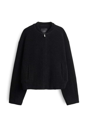 Schwarze, kurze Jacke aus strukturiertem Strickstoff mit Rundhalsausschnitt, Frontreißverschluss und zwei seitlichen Taschen.