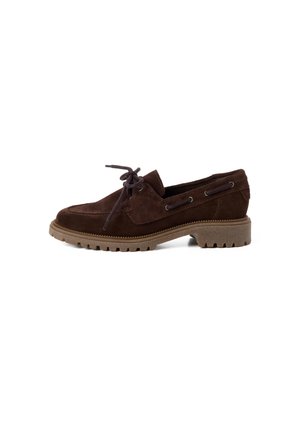 Dark brown suede lace-up shoe with thick tan rubber sole and raised heel, shown from the side on a white background.