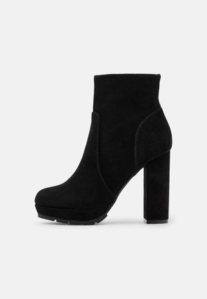 Bottines à talons hauts - black