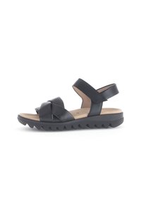 Zwarte leren sandalen met kruisbanden, gevoerd voetbed en een gestructureerde, geribbelde rubberen zool voor grip. Verstelbare enkelband.