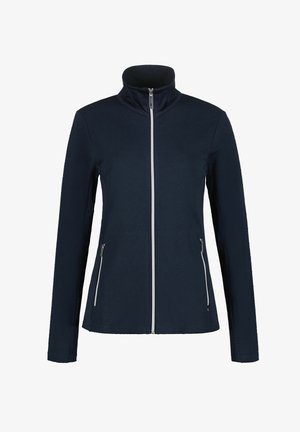 Laivastonsininen takki, jossa on korkea kaulus, teksturoitu kuvio, kokovetoketju ja kaksi sivutaskua vetoketjulla lisätoiminnallisuutta varten.