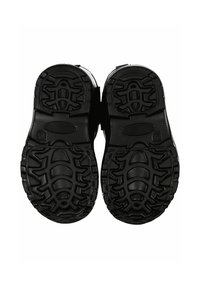 Svarta gummiskosålar med texturerat mönster, som har djupa spår och en central oval accent för ökad grepp och stabilitet.