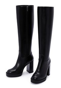 Black knee-high boots with a smooth leather finish, featuring a side zipper, chunky square heels, and a platform sole for added height.
