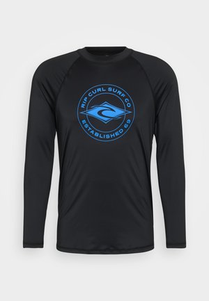 Crni rash guard dugih rukava s plavim kružnim logotipom koji sadrži tekst "Rip Curl Surf Co" i "Established 69". Glatki materijal, prilagođen dizajn.