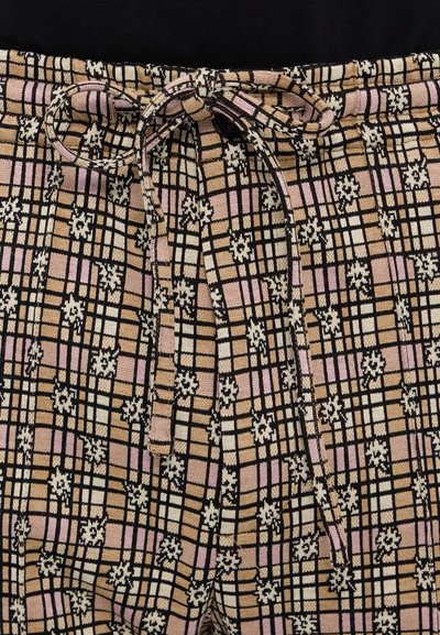 Multicolored patterned pants featuring a beige, pink, and black grid design with floral accents, elastic waistband, and tied drawstring.
