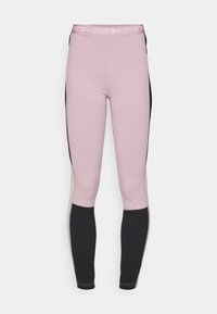 Rózsaszín sportleggings, rugalmas anyagból, fekete oldalpanelek díszítik. Széles derékpánttal rendelkezik, logóval és kontrasztszegéssel.
