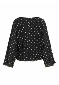 Must valge täpilise mustriga pluus, tekstuuriga kangas, laiad varrukad ja ruudukujuline kaelus. Tagantvaates on näha lõdvestunud lõige.