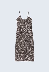 Robe midi noire sans manches avec fines bretelles et petit motif floral blanc, posée à plat sur un fond gris clair.