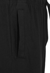 Nike Sportswear Treniņtērpa apakšdaļas - black / white