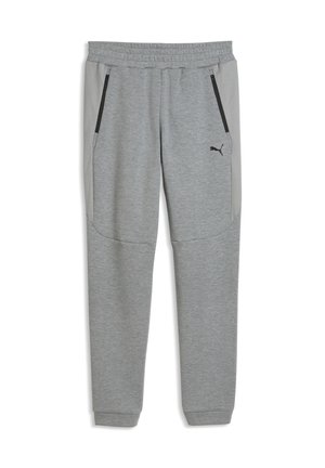 Grau zulaufende Sweatpants mit elastischem Bund, Reißverschlusstaschen an den Seiten, Mesh-Seitenteilen und kleinem schwarzen Puma-Logo am linken Oberschenkel.