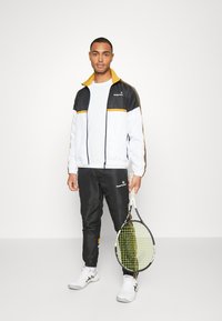Sergio Tacchini LISTA TRACKSUIT - Survêtement - black/white/harvest gold