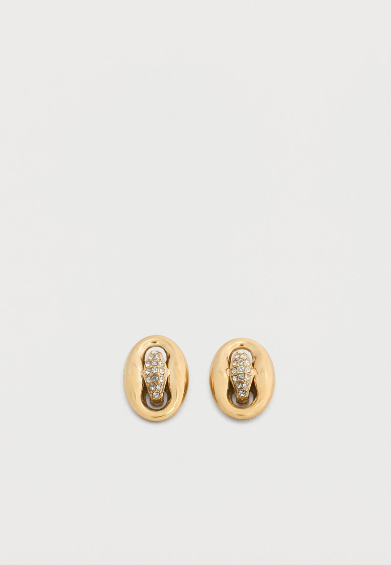 Χρυσά οβάλ σκουλαρίκια με κλιπ, με μια κεντρική μπάρα διακοσμημένη με μικρά διαφανή κρύσταλλα σε λευκό φόντο.