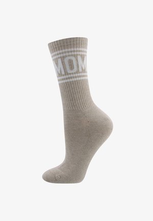 Beige katoenen sok met een ribbelstructuur; heeft witte "MOM" letters en decoratieve strepen aan de bovenkant. Ontworpen voor casual gebruik.