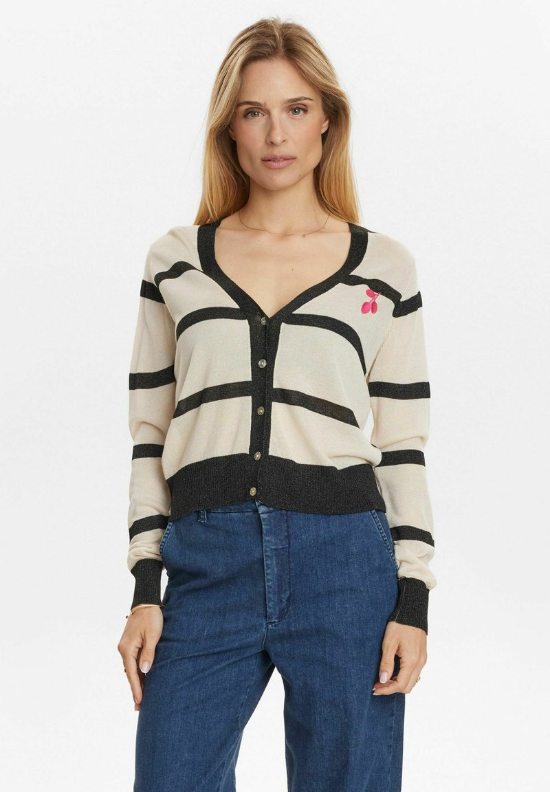 Beige cardigan with black stripes, v-neckline, button front, and ribbed cuffs. Features a small pink cherry design on the left side.