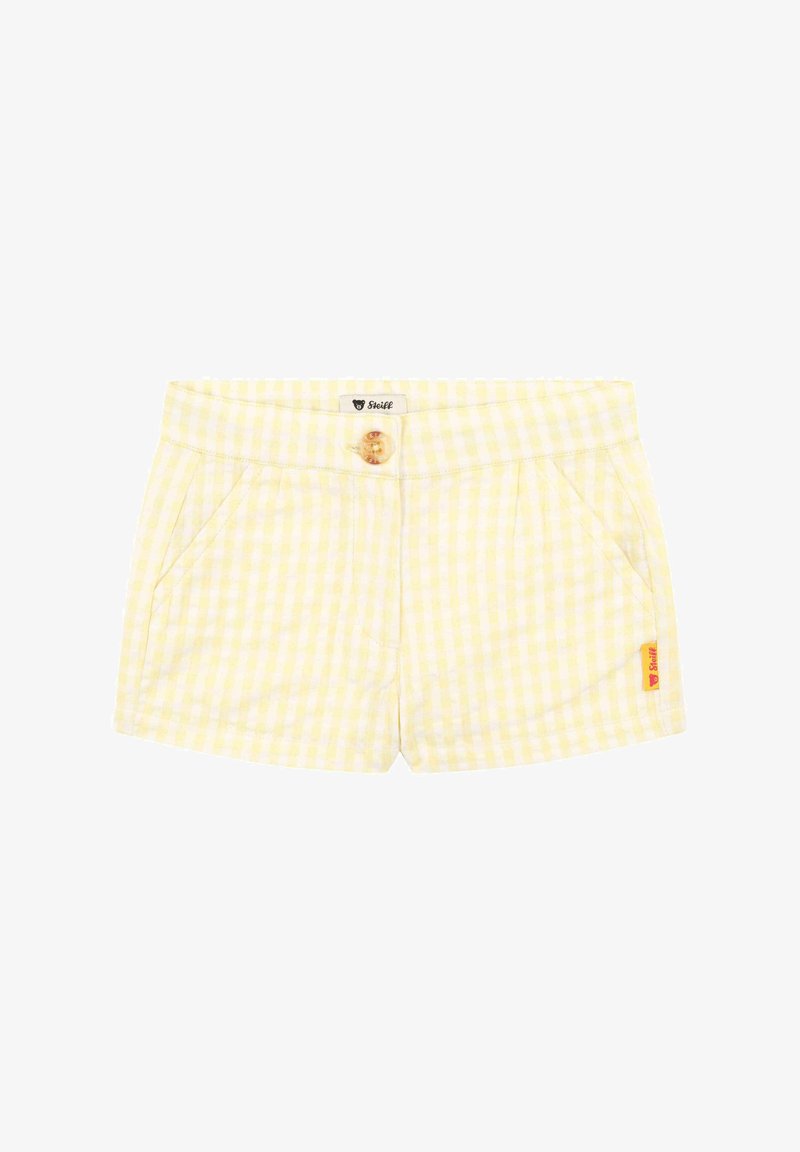 Shorts pour enfants à carreaux vichy jaune et blanc, avec poches avant, fermeture par bouton et petite étiquette de marque orange sur le côté.