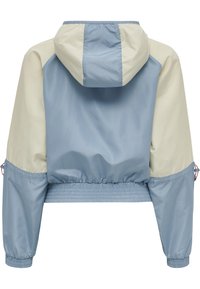 Cropped jacket with a blue and cream color-block design, featuring lightweight fabric, elastic cuffs, a hood, and drawstring at the hem.