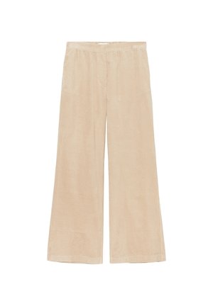 Pantalons en velours côtelé beige à jambe large avec une taille élastique. Texture en côtes verticales, longueur complète, sans fermetures ni poches visibles.